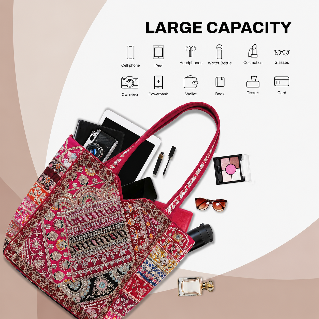 A large capacity tote bag with a vibrant red, pink, and multicolor paisley pattern, shown filled with various accessories like a camera, tablet, headphones, and cosmetics. The image includes a 'LARGE CAPACITY' text overlay with icons illustrating the bag's storage space.
